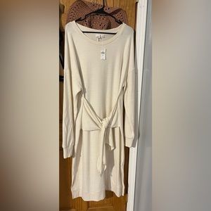 Cream colored sweater dress with tie front size large new with tags
